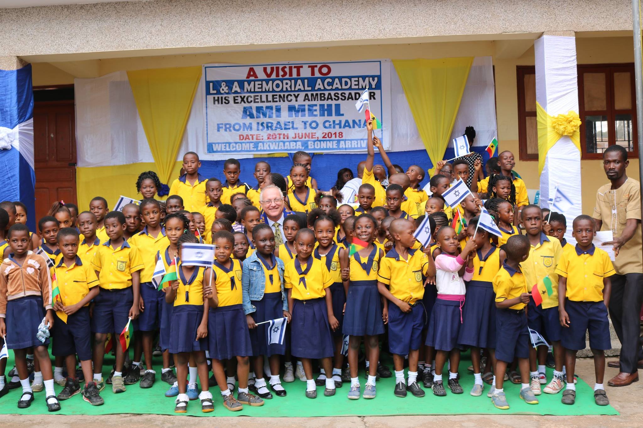 AMBASSADOR MEHL WITH SOME OF THE SCHOOL CHILDREN OF L&A ACADEMY